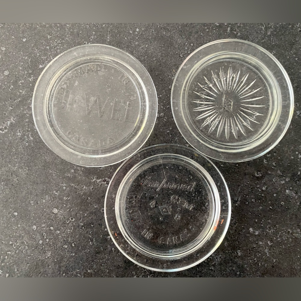 4 dozen vintage glass GEM size canning jar lids.